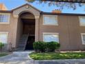 Two-story apartment building with well maintained landscaping and classic architectural details and a nice entryway at 2750 S Durango Dr # 2141, Las Vegas, NV 89117
