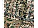 Aerial view of home in a golf course community close to the first hole and green belt at 3104 Birch Grove Ct, Las Vegas, NV 89134