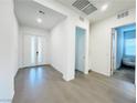 Bright entryway with neutral tones and tile flooring, leading into the home at 49 Charlotte Ridge Pl, Henderson, NV 89011