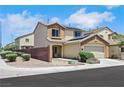 Street view of a two story home featuring solar panels and desert landscaping at 6678 Crystal Run Ln, Las Vegas, NV 89122