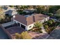 Beautiful aerial view of a single Gathering home with a large driveway and mature landscaping at 7745 Radcliff St, Las Vegas, NV 89123