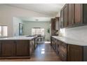 Bright kitchen showcasing custom cabinetry, stainless steel appliances, and sleek countertops, perfect for culinary enthusiasts at 7745 Radcliff St, Las Vegas, NV 89123