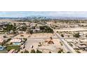Wide aerial shot showcasing the property's proximity to the city and its spacious lot at 8335 Rancho Destino Rd, Las Vegas, NV 89123