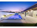 Enjoy the backyard's private pool, spa, and covered patio, perfect for outdoor entertaining at 8840 Harvest Sunset St, Las Vegas, NV 89113