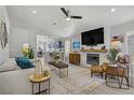 Bright living room featuring modern fireplace, open floor plan and stylish decor at 1604 Imperial Cup Dr, Las Vegas, NV 89117