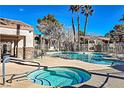 Community pool and spa offer residents a relaxing outdoor oasis with ample seating at 2101 Sealion Dr # 108, Las Vegas, NV 89128