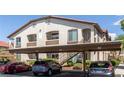 Apartment complex with covered parking, landscaped grounds, and convenient access to unit entrances at 2305 W Horizon Ridge Pkwy # 524, Henderson, NV 89052