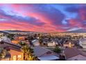 Scenic aerial view of the city skyline and surrounding mountains at sunset at 360 Rosefinch St, Henderson, NV 89012