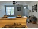 Bright living room with large window, stylish decor, and a sink view at 5855 Valley Dr # 2092, North Las Vegas, NV 89031