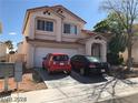 Charming two-story home with a two-car garage and covered porch area for welcoming guests at 8769 Country View Ave, Las Vegas, NV 89129