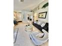 Bright living room with neutral tones, comfortable seating, and stylish decor at 3329 Hidden Ridge St, Las Vegas, NV 89129