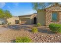 Lovely single-story home with desert landscaping, brick accents, and a two-car garage at 5953 Yellow Ridge Ave, Las Vegas, NV 89131