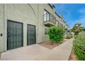 Charming two-story home with secure front doors and maintained landscaping at 7066 Burcot Ave # 59, Las Vegas, NV 89156