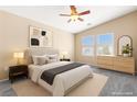 Serene main bedroom featuring neutral walls, a ceiling fan, and natural light at 9338 Square Dance Pl # 101, Las Vegas, NV 89178