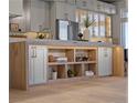 Beautiful kitchen island with wood accents and concrete countertops and ample storage space at 2508 Faiss Dr, Las Vegas, NV 89134