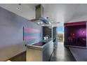 Stylish kitchen with stainless steel island, sleek appliances, and modern design at 4381 W Flamingo Rd # 3221, Las Vegas, NV 89103