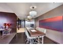 Contemporary kitchen featuring a large island with seating and stainless steel appliances at 4381 W Flamingo Rd # 3221, Las Vegas, NV 89103
