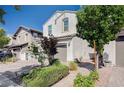 Attractive two-story home showcasing its tidy landscaping and a private two-car garage at , Henderson, NV 89011