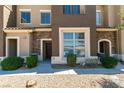Attractive two-story townhouse featuring stone accents and a well-maintained front yard at 2786 Fountain Ridge Ln, Henderson, NV 89074