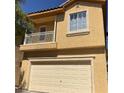 Two-story home boasting a two-car garage and a quaint balcony at 3508 Harbor Tides St, Las Vegas, NV 89147