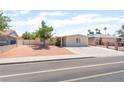 Charming single-story home with a simple yard, offering easy upkeep and a clean look at 409 Antelope Way, Las Vegas, NV 89145