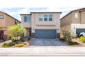Charming two-story home featuring a well-maintained front yard, a paved driveway, and an attached garage at 7211 Alabaster Peak St, Las Vegas, NV 89166