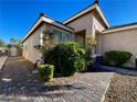 Welcoming front walkway leading to the entrance, enhanced by lush greenery, and decorative rock landscaping at 3532 Mountain Park St, Las Vegas, NV 89129