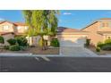 Inviting single-story home featuring a well-manicured front yard and a convenient two-car garage at 3532 Mountain Park St, Las Vegas, NV 89129