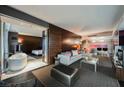 Open-concept space with a living room, soaking tub, and connecting bedroom, creating a luxurious and relaxed atmosphere at 4381 W Flamingo Rd # 2902, Las Vegas, NV 89103