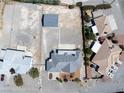 A captivating aerial view of the property, showcasing its spacious lot and charming neighborhood surroundings at 3241 E Winery Rd, Pahrump, NV 89048