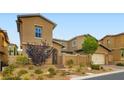 Charming two-story home with well-manicured landscaping and inviting curb appeal at 391 Capistrano Vistas St, Las Vegas, NV 89138