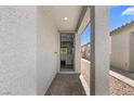 Inviting front door view with a peek into the home's interior at 5936 Bruselas St, Las Vegas, NV 89113
