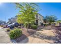 Landscaped front yard with gravel and desert foliage at 104 Pollentia Ave, North Las Vegas, NV 89084