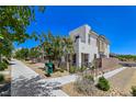 Modern two-story home with drought-resistant landscaping, pedestrian sidewalk and convenient community mailbox at 11739 Emerald Lake Ave, Las Vegas, NV 89138
