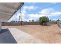 Large backyard with ample space, partially fenced, ideal for outdoor activities at 1313 Purple Sage Ave, Las Vegas, NV 89108
