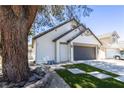 Charming one-story home featuring new landscaping, an attached garage, and a well-maintained front yard at 363 El Pico Dr, Henderson, NV 89014