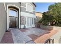 Charming home featuring a paved front yard, a landscaped garden and a stylish entry door at 3934 Sangre De Cristo Ave, Las Vegas, NV 89118