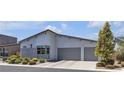 Charming house with an attached two-car garage and inviting curb appeal at 5927 Villa Loma St, Las Vegas, NV 89148