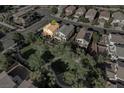 An aerial view shows a community with well-maintained landscaping and a park nearby at 1013 Brinkman St, Las Vegas, NV 89138