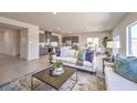 Open-concept living space with a seamless flow from the living area to the kitchen and dining space at 1301 Miller Springs Ln # Lot 93, North Las Vegas, NV 89084