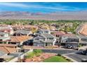 View of a two-story home in a neighborhood with mountain views at 1523 Great Sands St, Boulder City, NV 89005