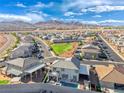 Aerial view of the home's backyard pool and the neighborhood at 1523 Great Sands St, Boulder City, NV 89005