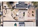 Bird's-eye view of the property featuring a spacious yard and unique architectural design at 2755 E Russell Rd, Las Vegas, NV 89120