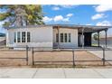 Charming single-story home with stucco siding, covered porch, and bay windows offers curb appeal at 3684 Hawaii Ave, Las Vegas, NV 89104