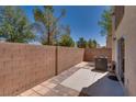 Private, walled backyard patio provides the perfect space for outdoor relaxation and entertaining at 3936 Pepper Thorn Ave # 3, North Las Vegas, NV 89081