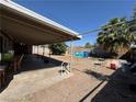 Expansive backyard with a covered patio and ample space for outdoor activities and entertaining at 4503 Springdale Ave, Las Vegas, NV 89121