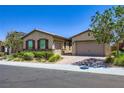 Attractive single-Gathering home featuring a brick driveway and manicured front yard at 800 Rosewater Dr, Henderson, NV 89011