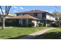 Inviting townhome with lush green lawn and cozy residential feel on a sunny day at , Las Vegas, NV 89119
