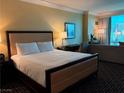 Well-appointed bedroom offers a cozy king bed, soft linens, and a relaxing ambiance at 2000 N Fashion Show Dr # 2627, Las Vegas, NV 89109