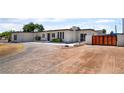 Single-story home showcasing a well-kept front yard and custom gate at 5617 Alfred Dr, Las Vegas, NV 89108